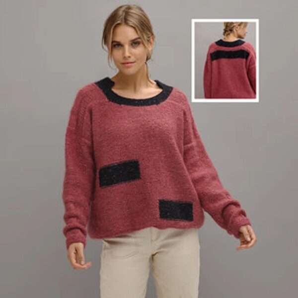 Lady wearing block patterned fleecy jumper