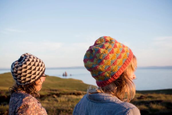 Ladies wearing bright knitted beanies